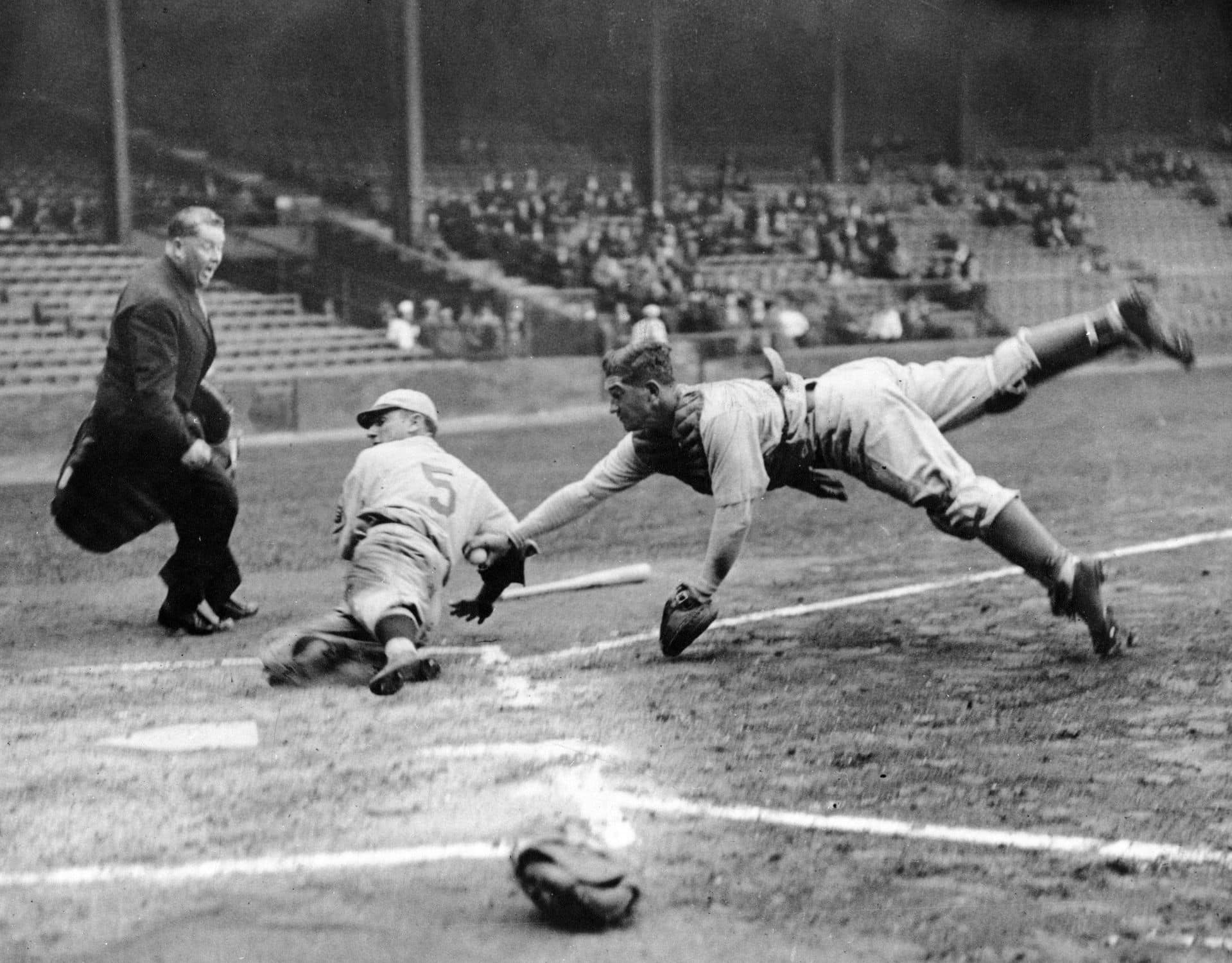 Mickey Cochrane diving to make the tag