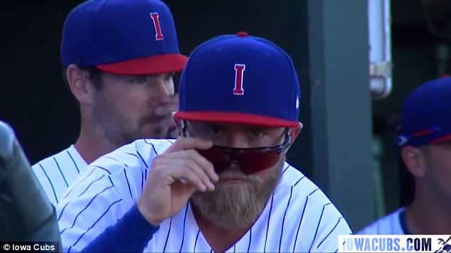 Iowa Cubs catcher Taylor Davis staring at camera doing Zoolander impression
