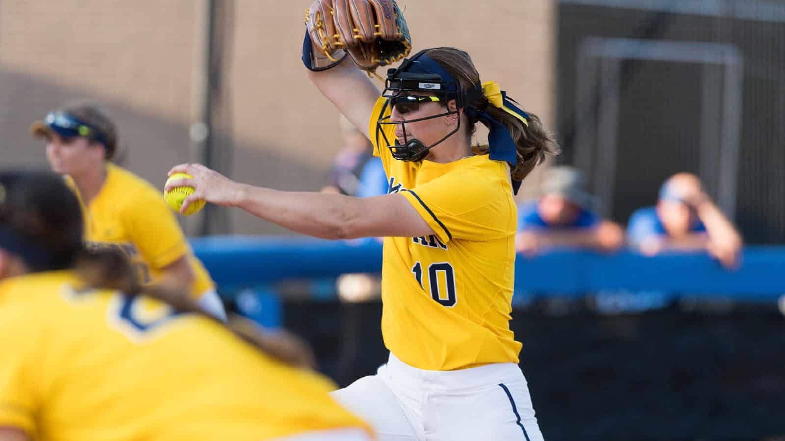 softball pitcher wearing sunglasses